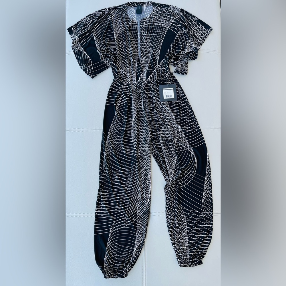 NWT! Norma Kamali 
Rectangle Jog Jumpsuit 
in Electric Circus 
Size XS/34